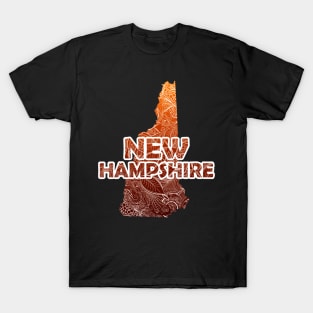 Colorful mandala art map of New Hampshire with text in brown and orange T-Shirt